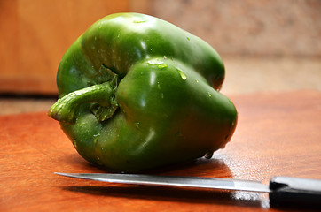 Image showing Fresh pepper with knife