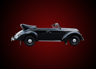 Image showing retro car isolated on the dark background