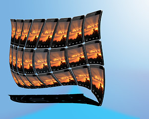 Image showing smart-phones with sunset in strange shape