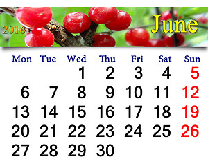 Image showing calendar for June 2016 with red berries of Prunus tomentosa