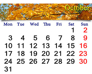 Image showing calendar for October 2016 with yellow leaves