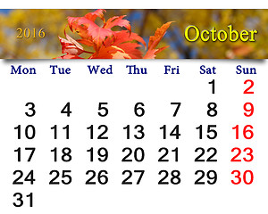 Image showing calendar for October 2016 with red and yellow leaves