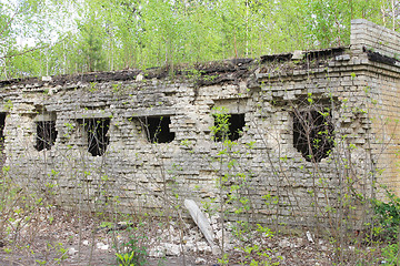 Image showing old desolate building with broken windows