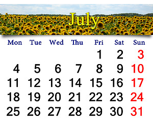 Image showing calendar for July 2016 with yellow fly on the sunflower