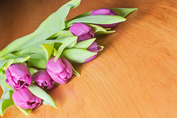 Image showing Violet tulips on the table