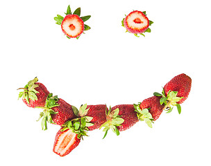 Image showing Smile with tongue out fresh juicy strawberries