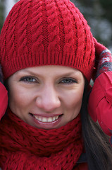 Image showing young beautiful woman in a red cup