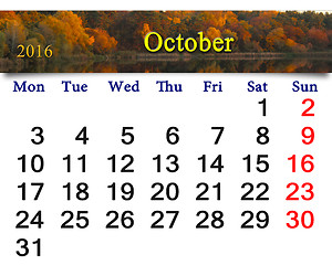 Image showing calendar for October 2016 and forest lake with trees