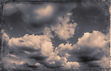 Image showing Vintage sky background with dark border and retro texture.