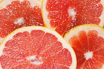 Image showing grapefruit red cut by pieces