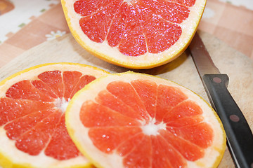 Image showing grapefruit red cut by pieces