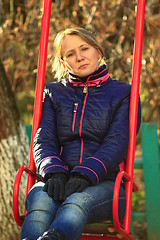 Image showing woman going for a drive on the swing