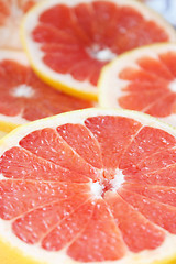 Image showing grapefruit red cut by pieces