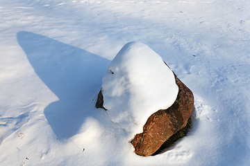 Image showing stone under snow 