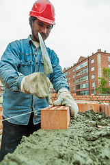 Image showing Bricklayer on house construction