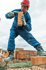 Image showing Bricklayer on house construction