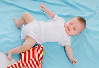 Image showing baby on blue blanket