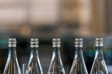 Image showing Many bottles on conveyor belt