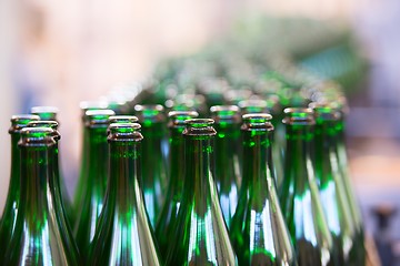 Image showing Many bottles on conveyor belt