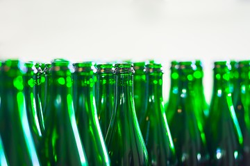 Image showing Many bottles on conveyor belt