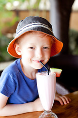 Image showing kid drinking cocktail