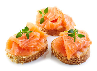 Image showing baguette slices with fresh salmon