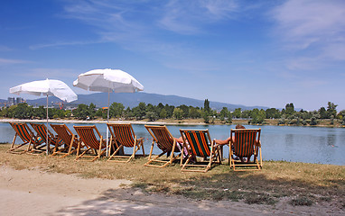 Image showing Colorful deckchairs