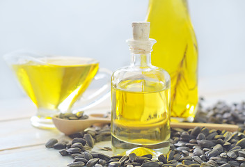 Image showing sunflower seeds and oil