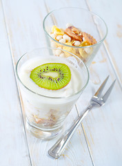 Image showing fresh yogurt and muesli in a glass