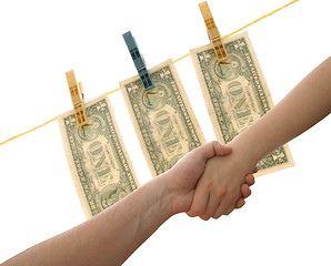 Image showing Dollars on the wire