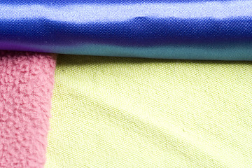 Image showing Yellow, pink and blue blanket