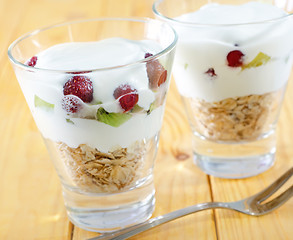 Image showing yogurt and oat flakes