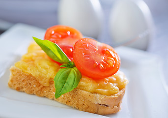 Image showing bread with cheese,tomato and basil