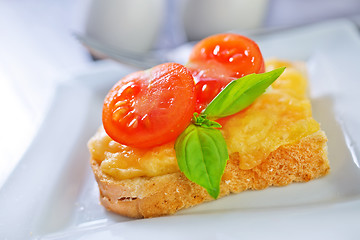 Image showing bread with cheese,tomato and basil