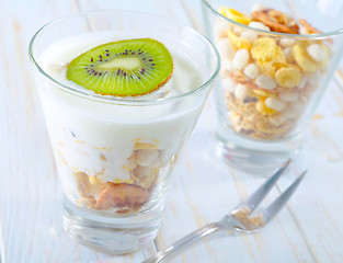 Image showing fresh yogurt and muesli in a glass