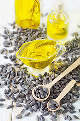 Image showing sunflower seeds and oil