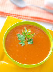 Image showing Fresh soup from pumpkin in the green bowl