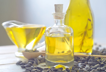 Image showing sunflower seeds and oil