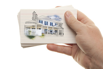 Image showing Male Hand Holding Stack of Flash Cards with House Drawing