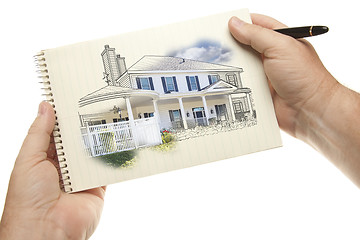 Image showing Hands Holding Pen and Pad of Paper with House Drawing