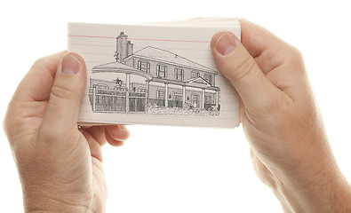 Image showing Male Hands Holding Stack of Flash Cards with House Drawing