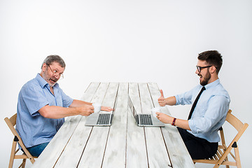 Image showing The two colleagues working on project together