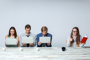 Image showing Business team working on their business project together at office