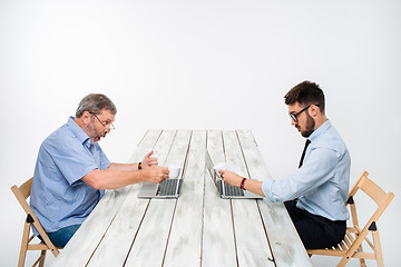 Image showing The two colleagues working on project together