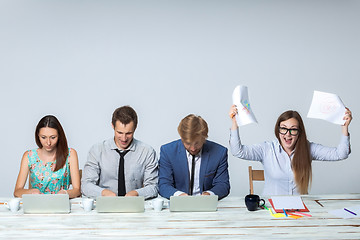 Image showing Business team working on their business project together at office