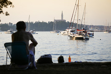 Image showing Man sitting in chair on Adriatic coast