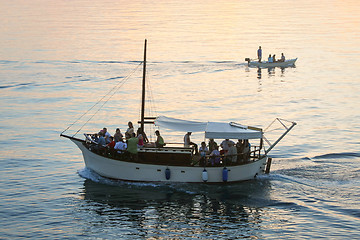 Image showing Boats sailing at sunset