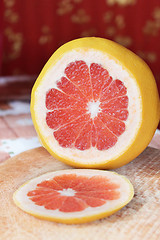 Image showing cut grapefruit on the table