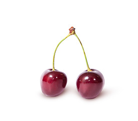 Image showing Two burgundy sweet cherries