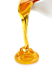 Image showing pouring honey